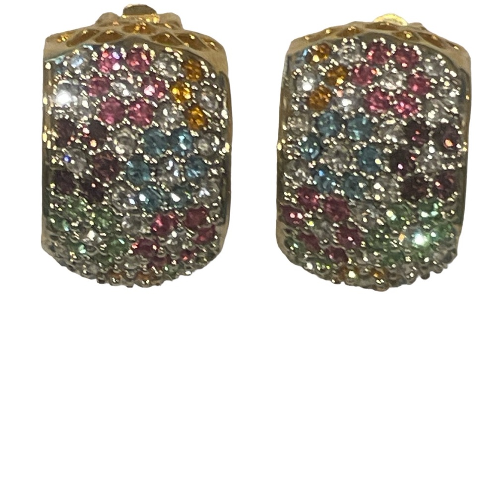 Multiple color floral clip earrings with gold tone accents.